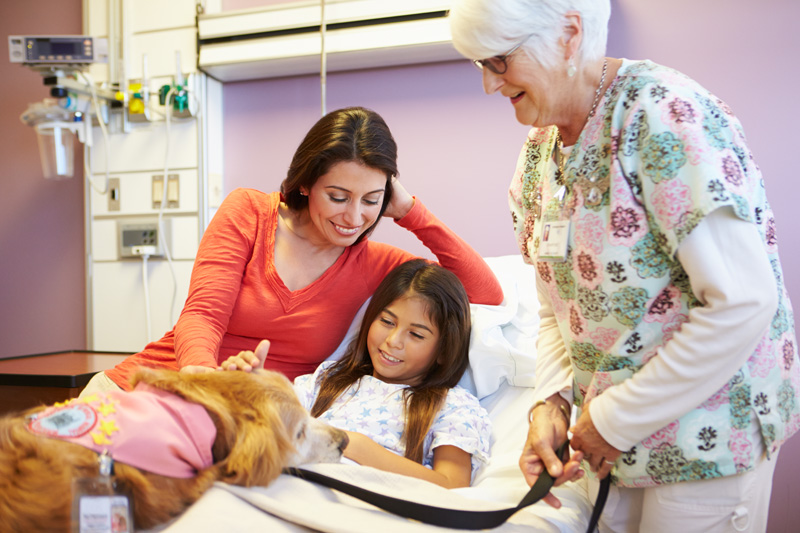 family at a child's bedside